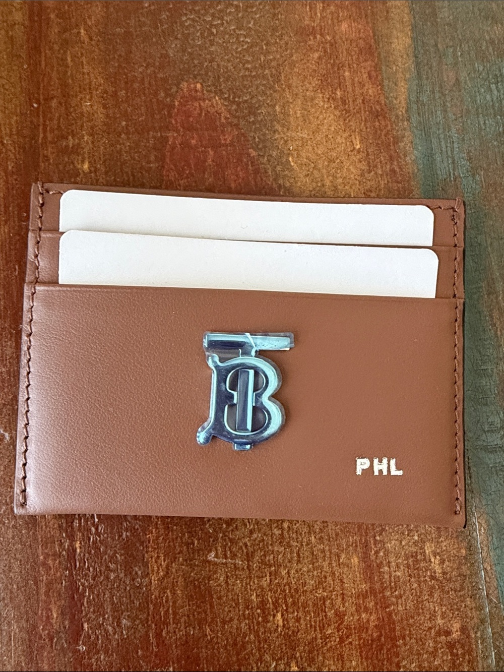 NWOT Burberry Tan Leather Card Holder with Silver TB Monogram has initials PHL